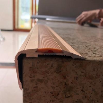 China Wall Corner Edge Floor Transition Non Slip Brass Stair Sniffing For Stair Edge Protection for sale