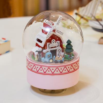 China Wooden Light and Plant Crystal Diy Musical Box Diy Music Box Building Block For Kids Custom Music Box Christmas Gift for sale