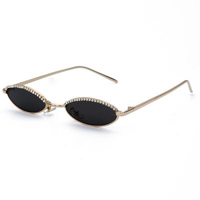 China Retro Cat Eye Sunglasses Vintage Round Diamond Sunglasses Fashion Small Rhinestone Oval Metal Frame for sale