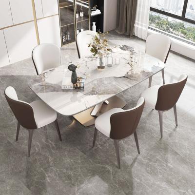 China Luxury Italian Stone Leg Rock Plate Modern Sintered Stone Dining Table for sale