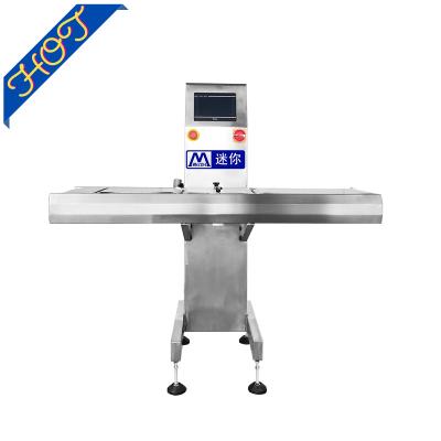 China Automachine electronic check weigher in cosmetics processing factory, weighing machine in mask production line for sale