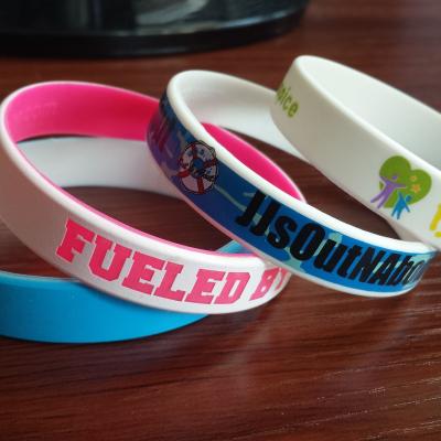 China Artificial Transparent Silicone Rubber Bracelets Custom Logo Silicone Wristband for sale