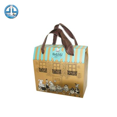 China Beautiful Design Ribbon Handle Paper Bag Printing Recyclable Gift Paper Packaging Bag for sale