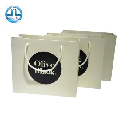 China Recycled Recycled Paper Bag Gift Shopping Paper Bags Suitable For Shopping In Malls for sale