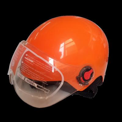 China Orange Winter Warm Protective Helmet Winter Protective Riding Helmet ABS Material for sale