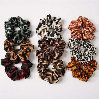 China Scrunchies Wholesale Large New Leopard Elastic Hair Tie Satin Fabric Scrunchies For Women for sale