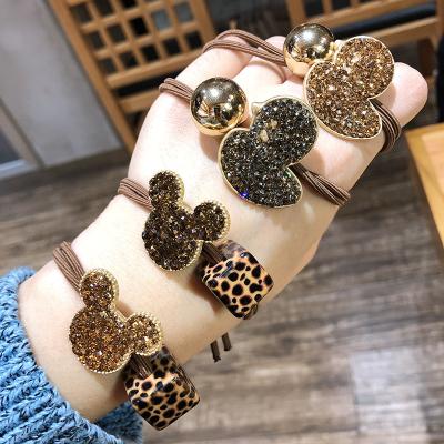 China Hot Selling Yellow Dark Hair Crystal Mickey Leopard Hair Ties Little Hair Ties Rings For Girls for sale