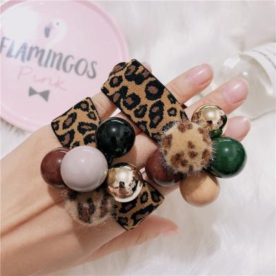 China Hot Selling Hair Tie Leopard Beads Elastic Hair Rope Ponytail Wide Holder Hair Tie For Women for sale