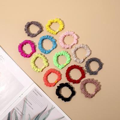 China Hair Ties Crinkle Thin Hair Tied Ins Cloth Button Solid Color Hot Selling Single Hair Band For Women for sale