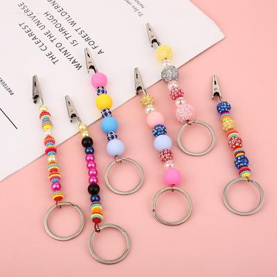 China Alligator Picture Card Diy Beads Key Chain Grabber Card Gift Long Nail Key Chain Colorful Iron Acrylic Clip for sale