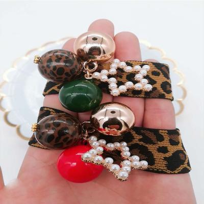 China Top quality Korean design/attractive star the same style hair rope hair beads elastic leopard scrunchie girls elastic hair band for sale