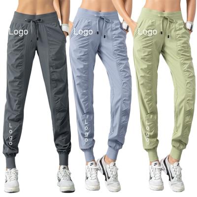 China Breathable S-XXL Plus Size Ruffle Design Slimming Loose Yoga Pants With Pocket High Quality Breathable Jogging Pants for sale