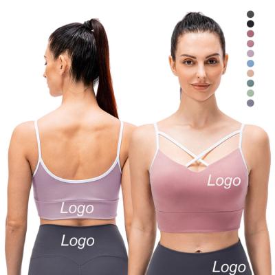 China Front Shockproof Running Workout Nylon Cavity Breathable Sexy Crossover Gym Bra Lift Up Skin Friendly Sports Bra for sale