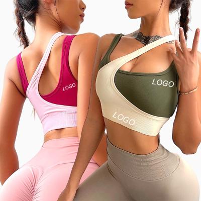 China Breathable Ladies Lined High Block Print Backless Bra Color Seamless Four Way Fitness Workout Bra Top for sale