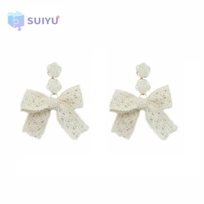 China New Trendy Elegant Pin Earrings Elegant White Rose Wedding Silver Rose Fabric Bow Tassel Fashion Earrings for sale