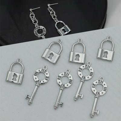 China Simple Alloy 3D Key And Lock Pendants Charms 3D Key And Lock Pendants Metal Lock DIY Jewelry Components And Findings for sale