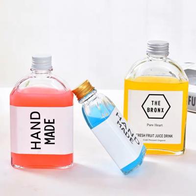 China 250ml 500ml Empty Transparent Frosted Glass Flat Glass Beverage Bottle Water Juice Milk Coffee Tea Drinking Bottle for sale