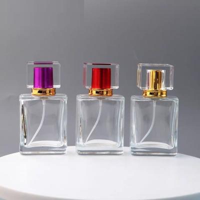 China Custom Private Cosmetic Your Own Logo Free Sample Luxury 10ml 30ml 50ml Clear Empty Glass Square Shaped Spray Perfume Bottle for sale