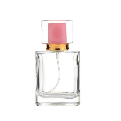 China Matte Black 30ml 50ml 100ml Rectangle Glass Perfume Bottle Cosmetic Square Perfume Oil With Spray Pump Cap for sale