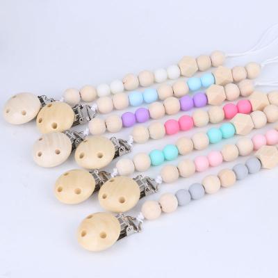 China 100%food grade Silicone Teether Feeding Silicone Beads Wooden Baby Pacifier Clips Baby Wooden Pacifier Chain for sale