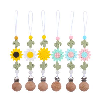 China 100%food grade silicone sublimation cactus BPA silicone dummy pacifier clip free chain sunflower holder for sale