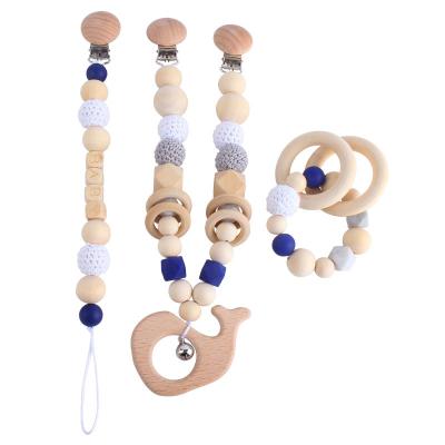 China Amazon New DIY Eco-Friendly Baby Rattle Toy Baby Bed Pram Garland Wooden Teether Beads Bracelet Pacifier Chain Clip Teether Set for sale