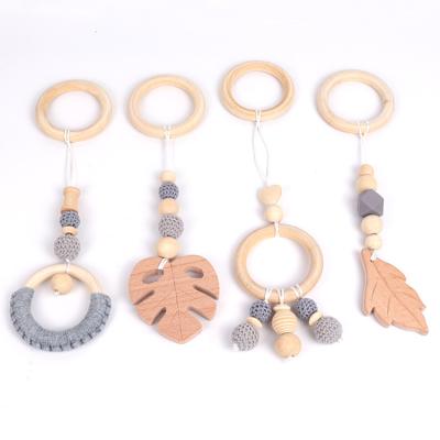 China New 2021Hot Sale Eco-Friendly New Baby Molar Wool Teether Toy Set Pendant Rod Cotton Woven Wood Circle Beech Wood Oendant Baby Room Beads for sale