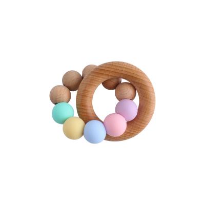 China 100%food grade Silicone Baby Teether Silicone Bead Toys Wooden Teether Ring Teething Teether Wristband Bracelet for sale