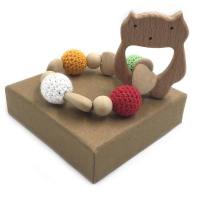 China 100% Eco-Friendly Natural Wooden Crochet Baby Teether Rattle Bracelet Animal Beads Teething Sensory Toys for sale