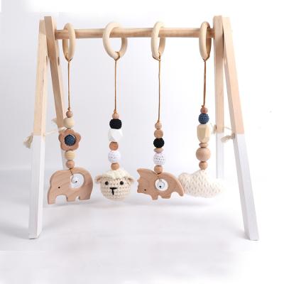 China 2021 New Eco-Friendly Four-Pcs Set Wooden Rattle Wooden Pendant Toy Baby Wooden Gym Baby Room Animal Decoration Beech Gyms Play Mats for sale