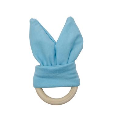 China Hot Sale Eco-Friendly Baby Teeth Ring Cute Bunny Ear Baby Teether Rattle Rabbit Ear Wooden Teether Bracelets for sale