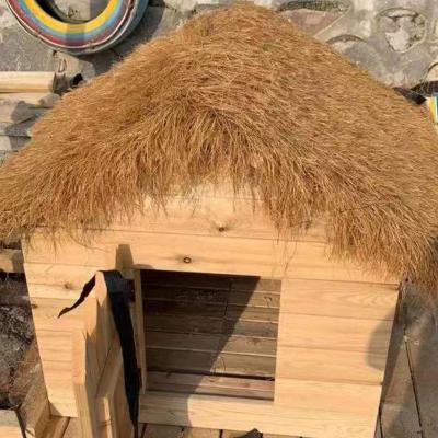 China PE tile thatched roof palm leaf lawn fluffy and thick plastic thatch roll that can be directly glued for sale