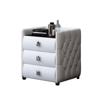 China Nordic modern white luxury bedside storage nightstand leather mesita de noche leather side tables tables for bedroom for sale