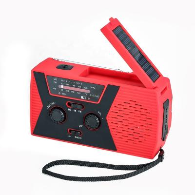 China Hot Sale PORTABLE AM Fm Portable Crank Dynamo Emergency Solar Powered Radio With Light for sale