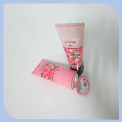 China plastic cosmetic tube with mirror flip top cap for sale