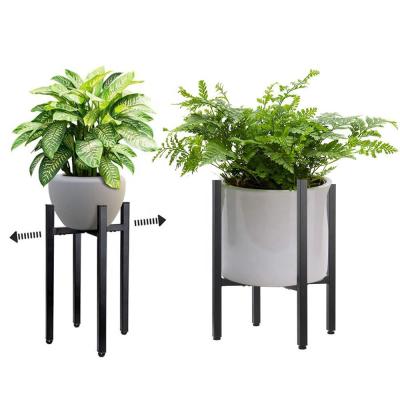 China Modern Black Modern Home Metal Flower Pot Adjustable 4 Tier Iron Plant Stand Plant Stand For Indoor Outdoor Flower Stand for sale