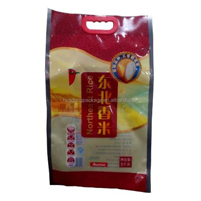 China Customized Size 1kg Rice Packing Plastic Bag Moisture Proof 2kg 5kg With Handle for sale