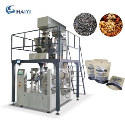 China Automatic rotary food premade doypack zipper bag seeds nuts packing machine for sale