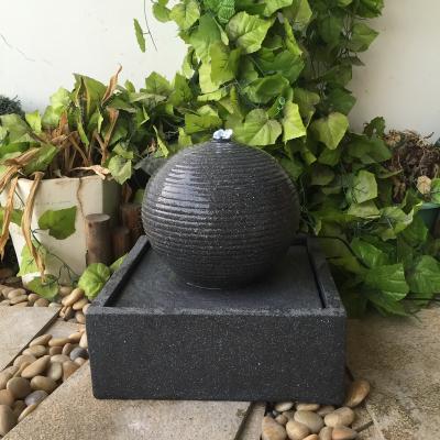 China Modern Water Feature Fiber stone Black Outdoor Solar Water Fountain with Led Light for Garden Decoration for sale