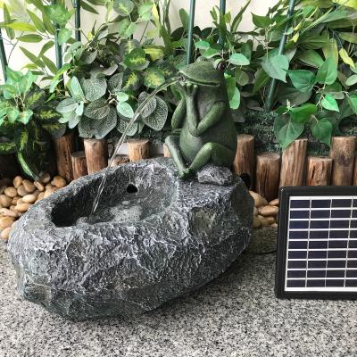 China Modern Water Feature Forg Spitter Outdoor Solar Water Fountain for Garden Decoration Ornaments Indoor and Outdoor Modern Water Feature 56*45*47cm for sale