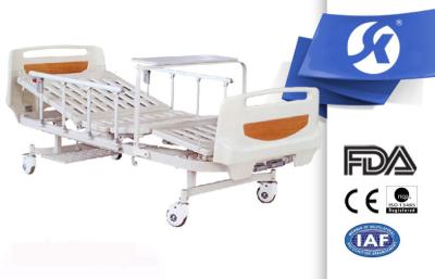 China 2 Cranks ABS Treatment Manual Hospital Bed With Turning Table And Shoes Holder for sale