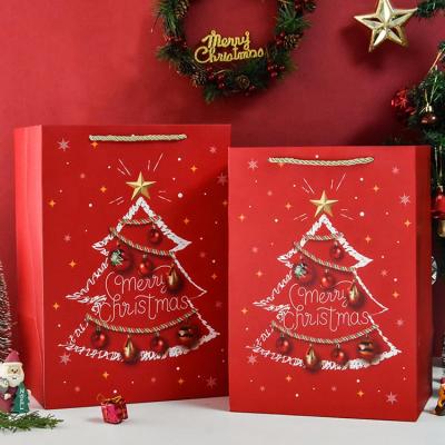 China HOT SALE High Quality Funny Design Christmas Tree Gift Paper Bags Disposable Resend for sale