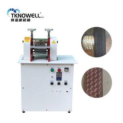 China This machine is suitable for continuous hot stamping of various leather belt machine hot sale embossing embossing machine long belts pneumatic belt roller for sale