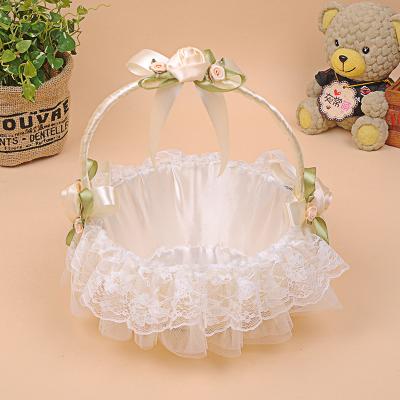 China Viable Portable Rattan Woven Ribbon Lace Wedding Bridesmaid Petal Basket Wedding Supplies for sale