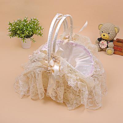 China Wholesale Creative Decorative Portable Rattan Woven Lace Wedding Basket Ribbon Storage Fruit Basket Viable for sale