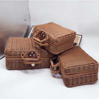 China Sustainable Handmade Picnic Basket Wholesale New Arrival Basket Storage Rattan Cane Basket With Brass Trim for sale