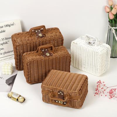 China New Creative Portable Rattan Woven Basket Case Viable Storage Box Picnic Basket Storage Suitcase Storage Rattan Small for sale