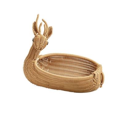 China New viable creative cartoon follow home office decoration males rattan fruit basket snack basket woven basket for sale