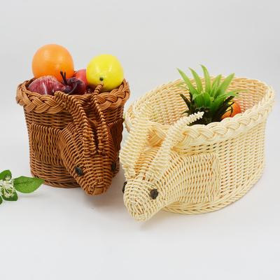 China New Viable Follow Rabbit Cartoon Rattan Crafts Basket Storage Creative Office Basket Decoration Snacks Home Supply Basket for sale