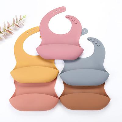 China Popular Silicone Baby Bib Waterproof Baby Eating Easy No Wash Food Bib Kids Saliva Pouch Rice Pouch To Carry Bibs for sale